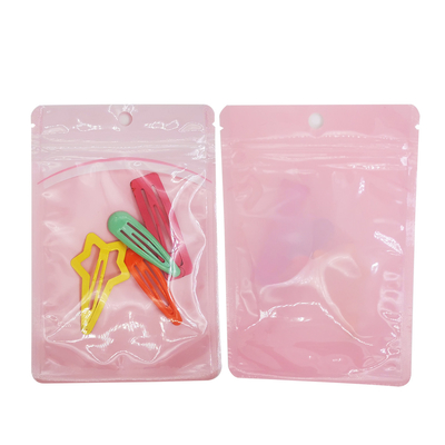 Sacs en plastique clairs sur un côté avec fermeture à glissière et trou suspendu pour les bonbons, les biscuits et les accessoires