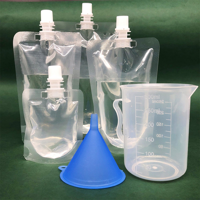 Des sacs à jet vertical transparents et transparents personnalisables pour les emballages de lait, de jus, de boissons et de café